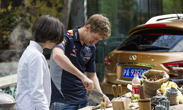  Vettel samples authentic local Shanghai cuisine in China on Wednesday.