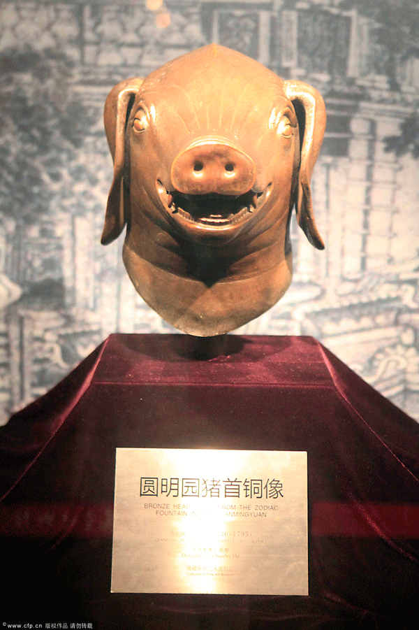 Yuanmingyuan bronze animal heads, including the heads of a tiger head, a pig head, a monkey head and a cow head were displayed at the Jiading Museum in Shanghai for the first time on Wednesday. [CFP] 