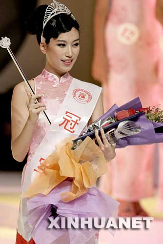 9月28日，第18届世界超级模特环球大赛中国总决赛在江西九江揭晓。这是获得冠军的重庆选手唐雁艳。 新华社记者 陈建力 摄 