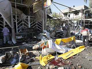 巴格达发生4起连环爆炸 造成近百人伤亡[组图]