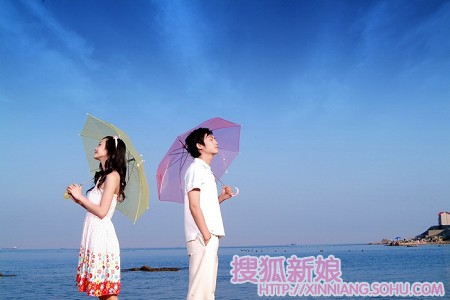 晒结婚照:海边外景 都说我很像周迅