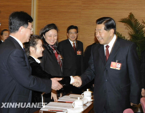 3月5日，中共中央政治局常委、全国政协主席贾庆林参加十一届全国人大二次会议北京代表团的审议。