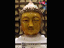 无锡灵山梵宫--黄釉陶佛头。中国网 摄影 杨佳