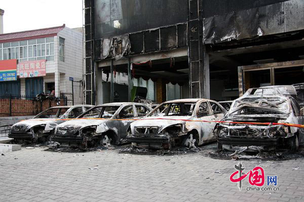 乌鲁木齐 “7.5”事件中被烧毁的店铺 汽车 