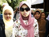 马来西亚女模喝酒被判鞭刑 因斋月延迟受罚[组图]