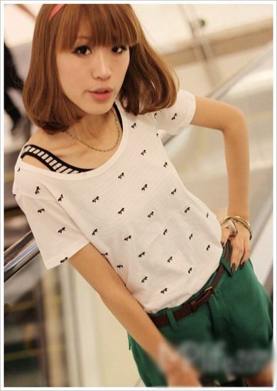 <em>一条</em>绿色<em>短裤</em> 搭出不同感觉_中国网