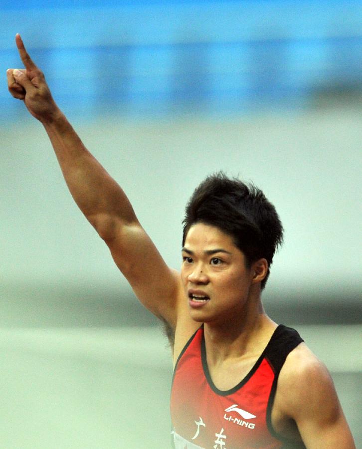 苏炳添百米比赛成功夺冠并打破全国记录[组图]