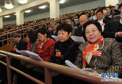  3月5日，第十一屆全國人民代表大會第五次會議在北京人民大會堂開幕。 這是政協委員列席開幕會。 新華社記者饒愛民攝