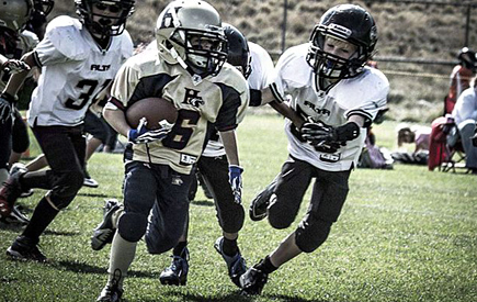 萝莉不让须眉 美9岁女孩成橄榄球健将[组图]