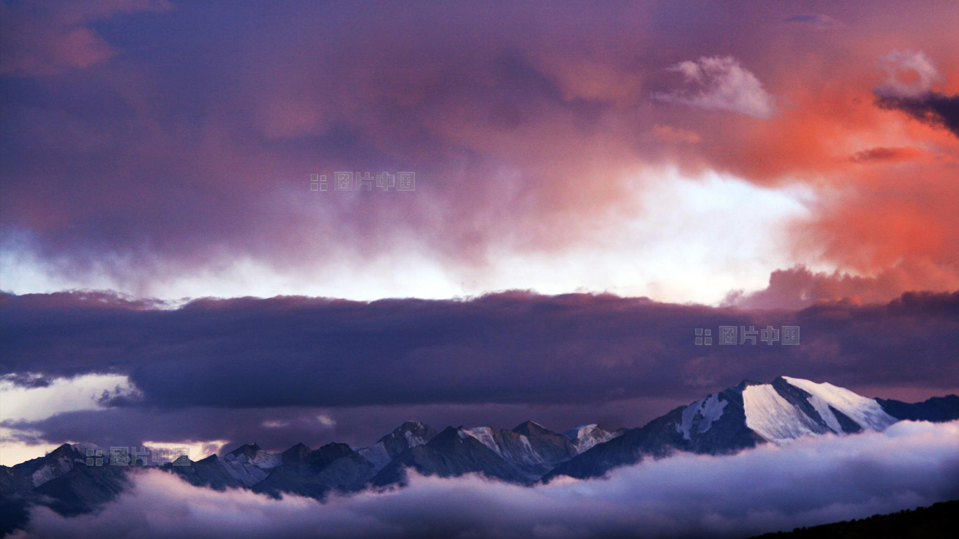 夕照雪峰。中国网图片库 赵欣 摄影