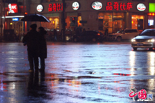 3月19日夜间至20日早晨，北京地区出现雨雪天气，将“倒春寒”的凉意带到了3月里的北京。中国网记者 寇莱昂摄影