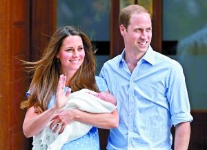 23日，威廉和凯特抱着乔治小王子走出医院。