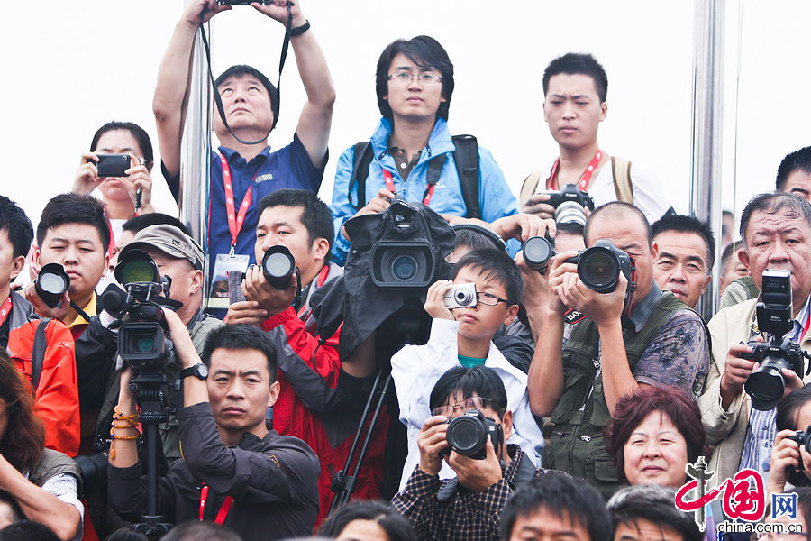 2013年平遙國際攝影節開展儀式現場的攝影師。中國網記者 鄭亮攝