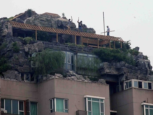 "最牛违建"拆除过半 月底前恢复原貌