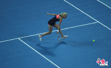 2013中国网球公开赛女单首轮，U-拉德万斯卡2-0哈勒普。中国网记者 陈维松/摄