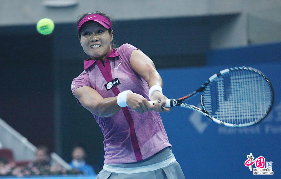 2013年9月29日，北京，2013中国网球公开赛女单首轮，李娜2-0汉图楚娃。中国网 陈维松 摄