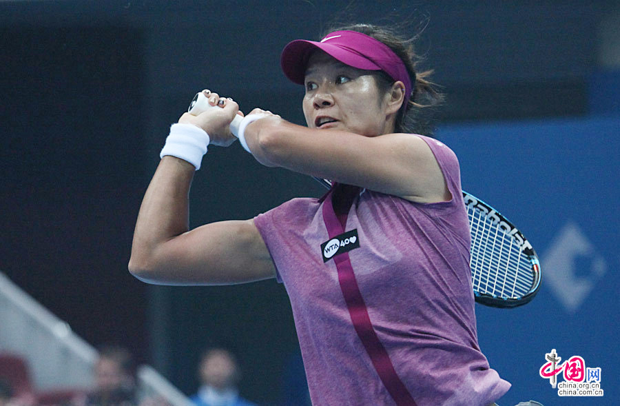 2013年9月29日，北京，2013中国网球公开赛女单首轮，李娜2-0汉图楚娃。中国网 陈维松 摄