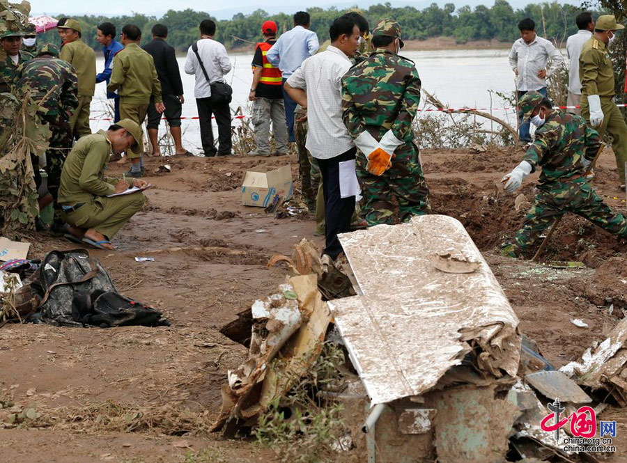 老挝失事飞机49人全部遇难遇难者遗体发现组图
