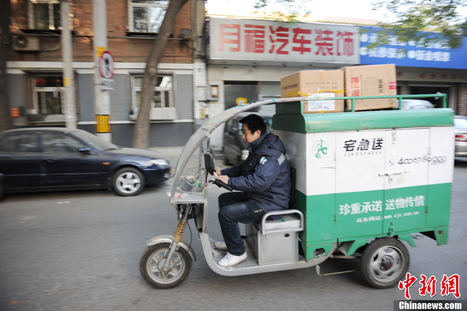 【圖片故事】“瘋狂”的快遞