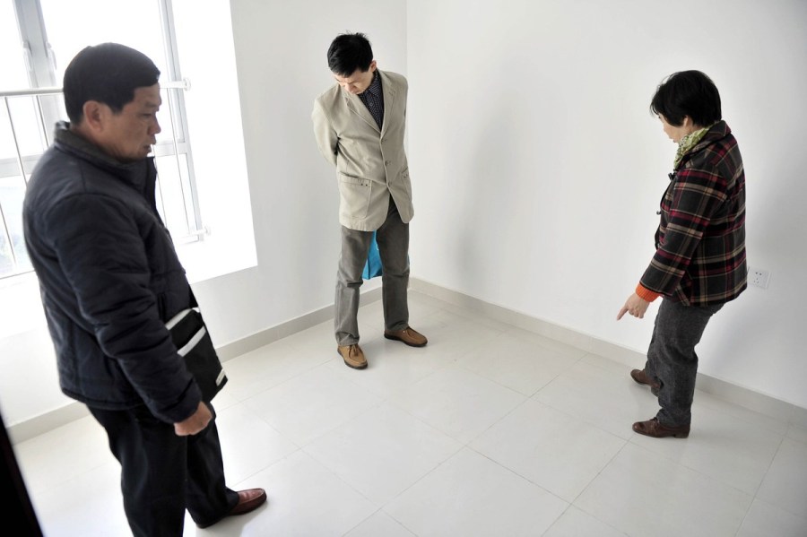 2014年1月23日，申请家庭参观天河区的安夏花园公租房。