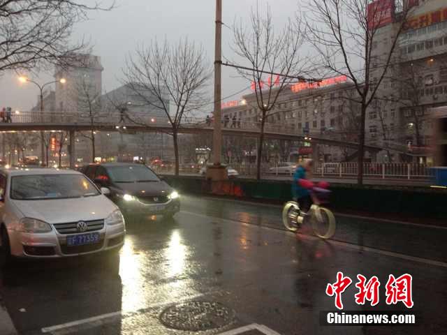 北京大部地区喜降春雨 雾霾或被驱散