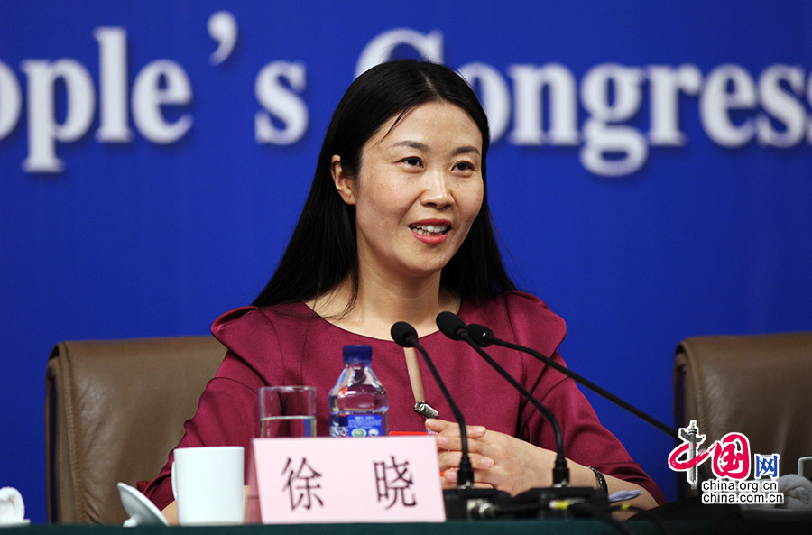 3月12日，全國人大代表、河南省開封城摞城發展有限公司董事長徐曉回答記者提問。