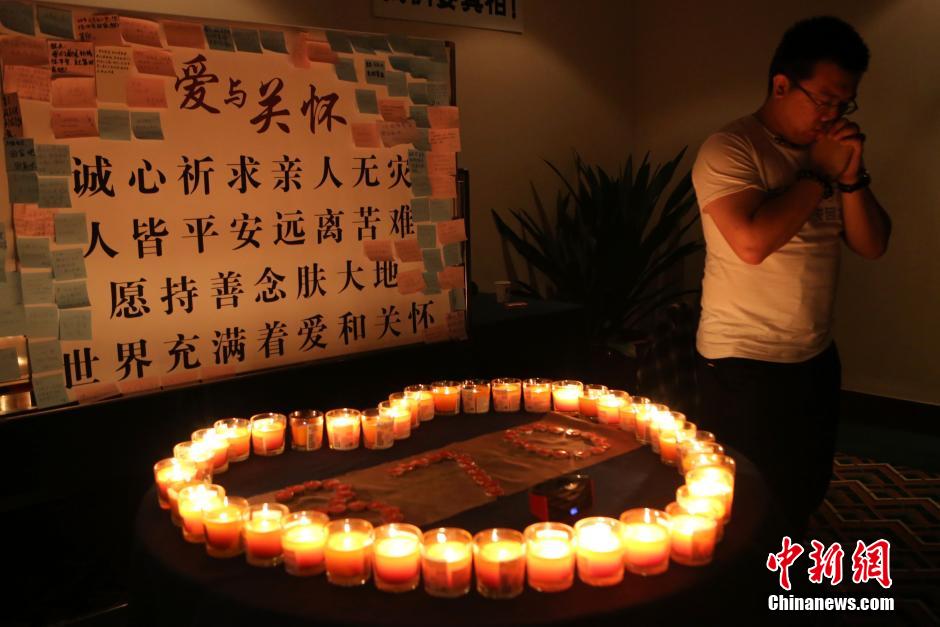 马航失联乘客家属为MH370祈福
