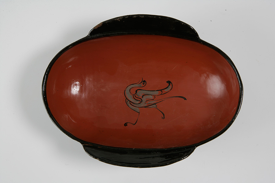 这是四川成都老官山西汉木椁墓出土的漆木耳杯（资料照片）。