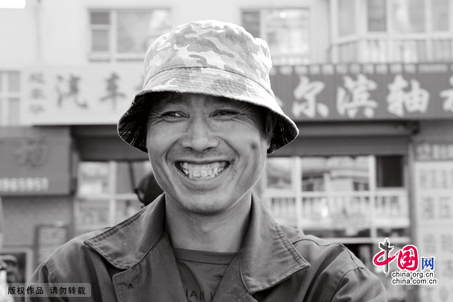 【图片故事】农民工的微笑