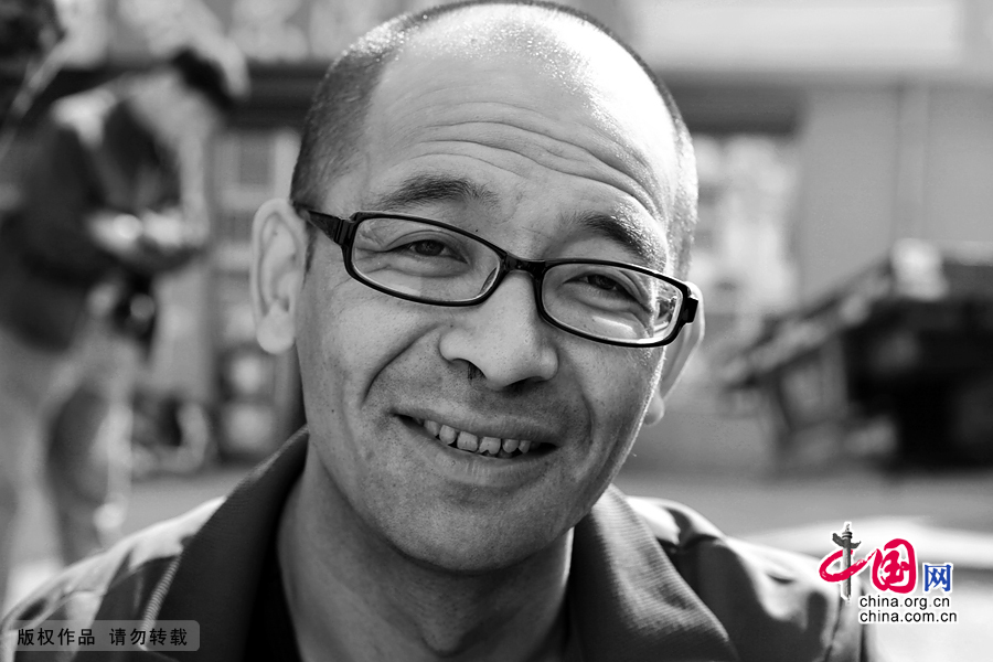 【图片故事】农民工的微笑