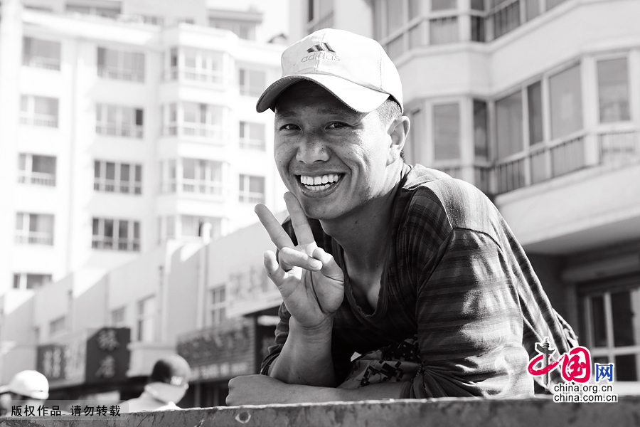 【图片故事】农民工的微笑