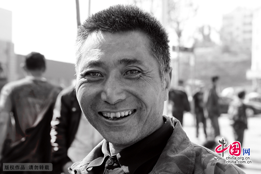 【图片故事】农民工的微笑