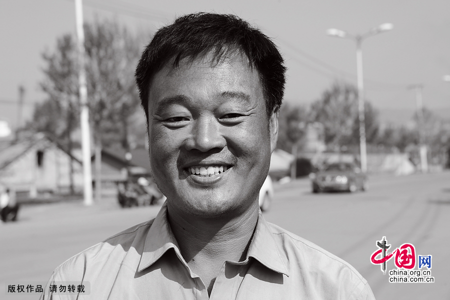 【图片故事】农民工的微笑