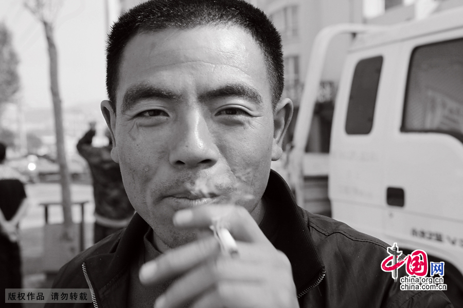 【图片故事】农民工的微笑