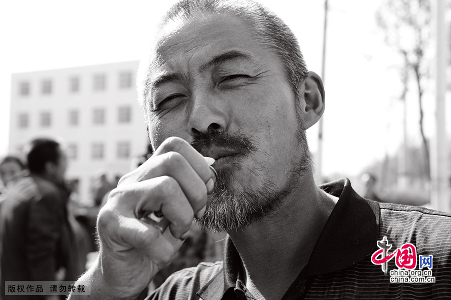 【图片故事】农民工的微笑