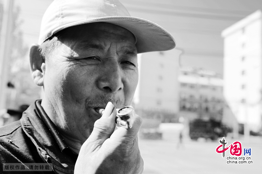 【图片故事】农民工的微笑