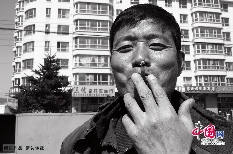 【图片故事】农民工的微笑