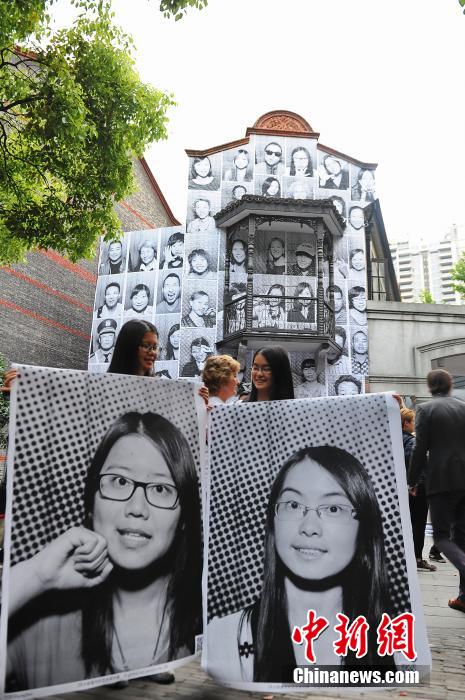 上海街頭現黑白肖像 拼貼城市表情