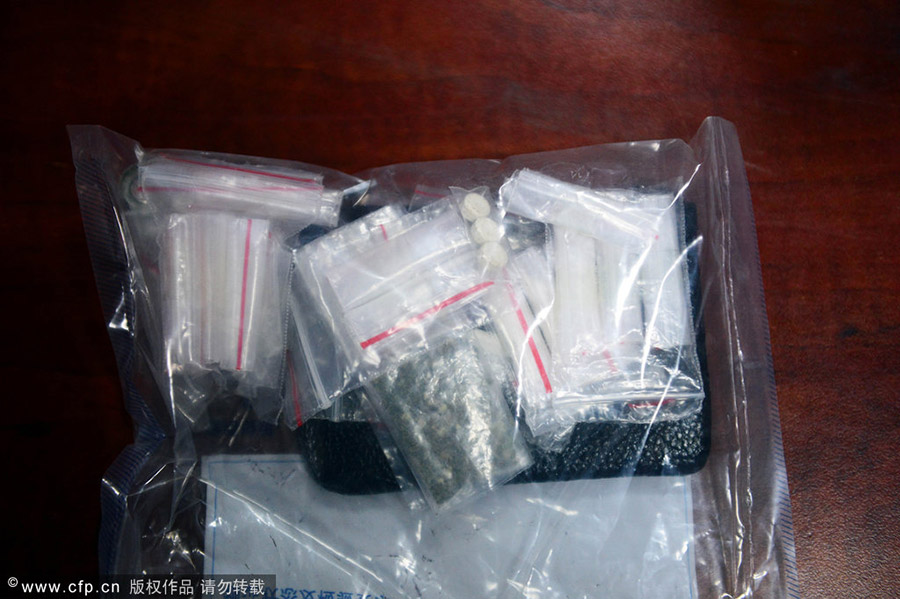 2014年5月22日晚，北京，現場繳獲各類毒品。