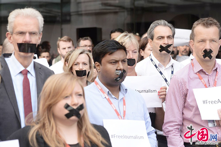BBC員工黑膠布封嘴抗議記者被判刑[組圖]