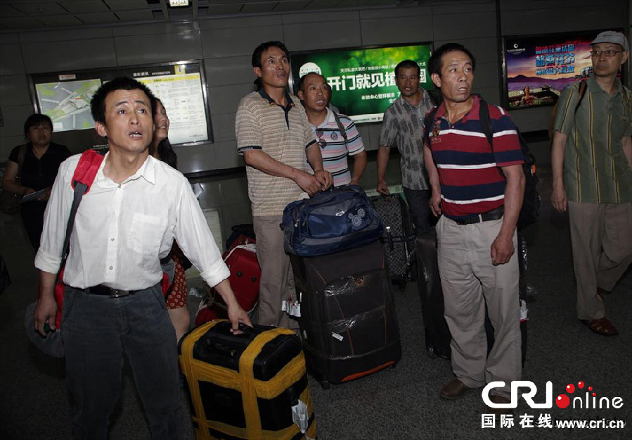 首批8名從伊拉克撤回中國工人回到廣州