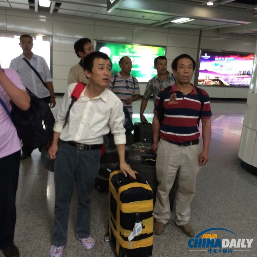 首批8名從伊拉克撤回中國工人回到廣州