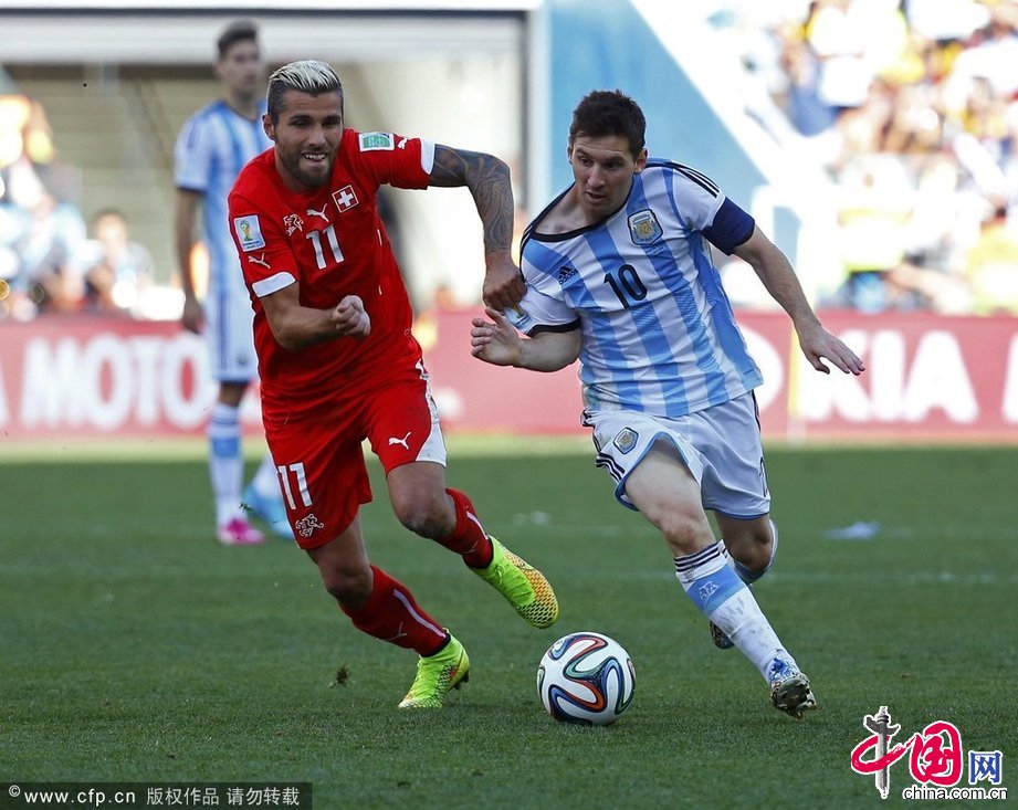 2014年7月1日，巴西圣保罗竞技场，2014巴西世界杯1/8决赛，阿根廷Vs瑞士。贝赫拉米防守梅西。CFP/CFP