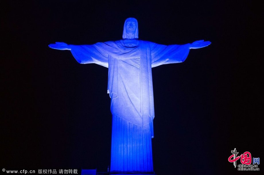 2014巴西世界杯第31日：里约基督像“改头换面” 德阿色彩点燃[组图]