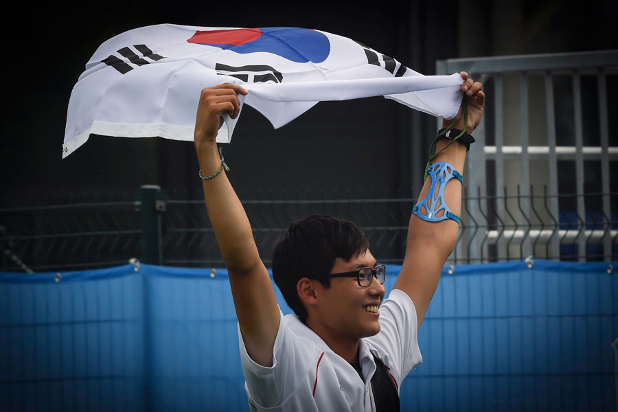 射箭：男子反曲弓个人比赛举行 韩国选手夺金[组图]