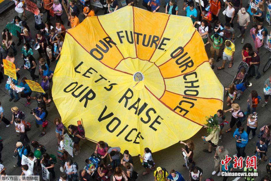 纽约举行大游行呼吁应对气候变化 各界名人参与