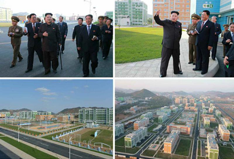 朝鲜领导人金正恩前往一处新建成的居住区视察图。