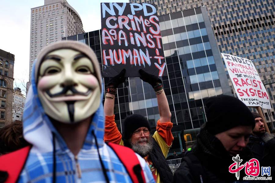 当地时间2015年1月19日，美国纽约，马丁·路德·金纪念日当天，示威者集会抗议种族歧视。图片来源：CFP