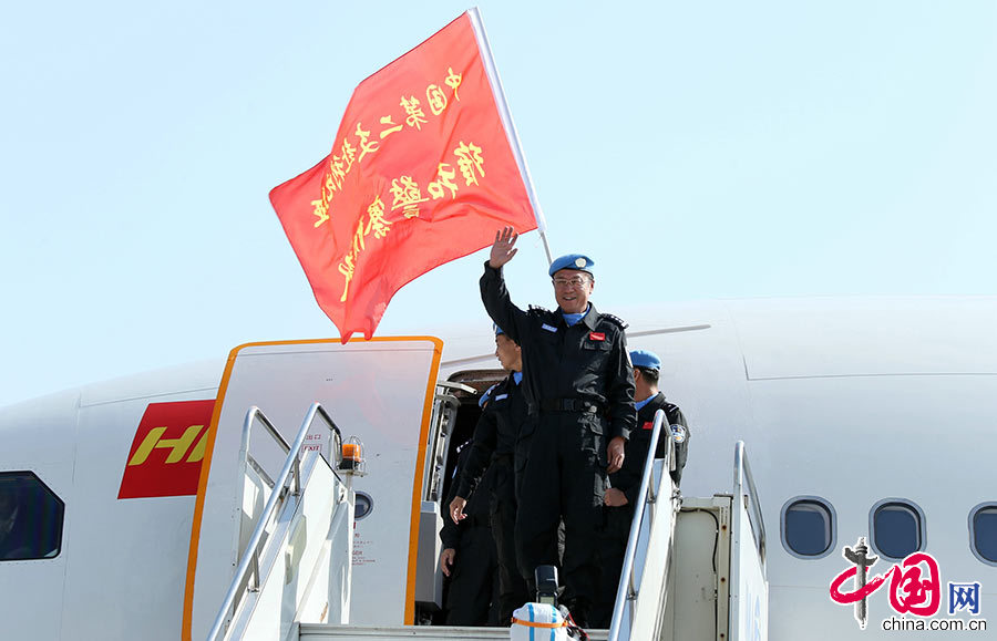 3月12日，中國第二支赴賴比瑞亞維和警察防暴隊圓滿完成任務凱旋回國。中國網圖片庫 托婭/攝
