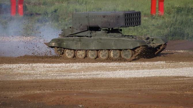 Russian TOS-1A Solntsepyok (Sunheat) heavy flame throwing launcher drives during the Army-2015 show at a shooting range in Alabino, outside of Moscow, Russia, on Tuesday, June 16, 2015. Russia’s military this year alone will receive over 40 new intercontinental ballistic missiles capable of piercing any missile defences, President Vladimir Putin said Tuesday in a blunt reminder of the nation’s nuclear might amid tensions with the West over Ukraine. (AP Photo/Ivan Sekretarev)